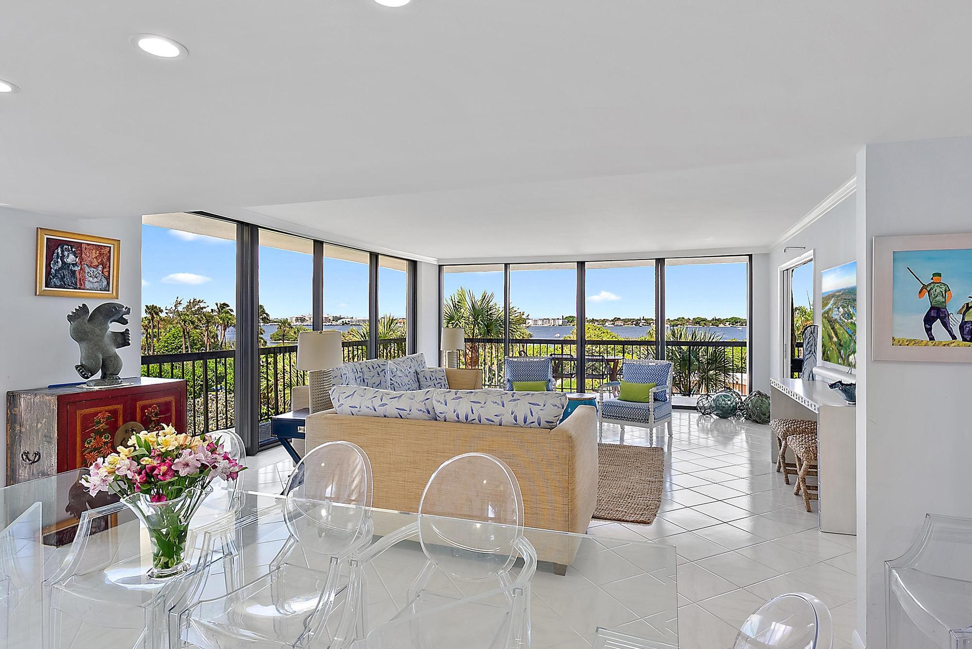 3390 South Ocean Boulevard, Unit 301 Palm Beach, FL 33480 - Photo 10 of 46 a dining hall with furniture and a large window