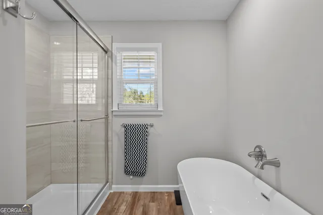 a bathroom with a sink and bathtub