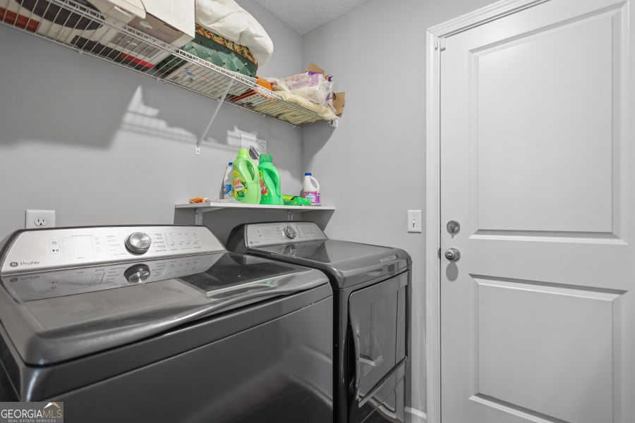 192 Hummingbird Lane Jesup, GA 31545 - Photo 21 of 26 a utility room with dryer and washer