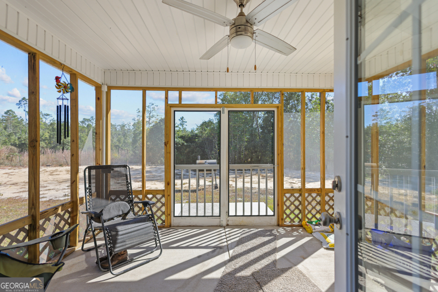 192 Hummingbird Lane Jesup, GA 31545 - Photo 22 of 26 a living room with hardwood floor and furniture