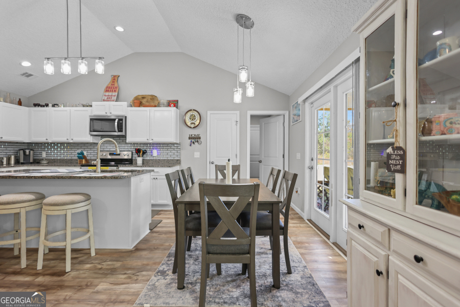 192 Hummingbird Lane Jesup, GA 31545 - Photo 9 of 26 a view of a dining room with furniture window and outside view