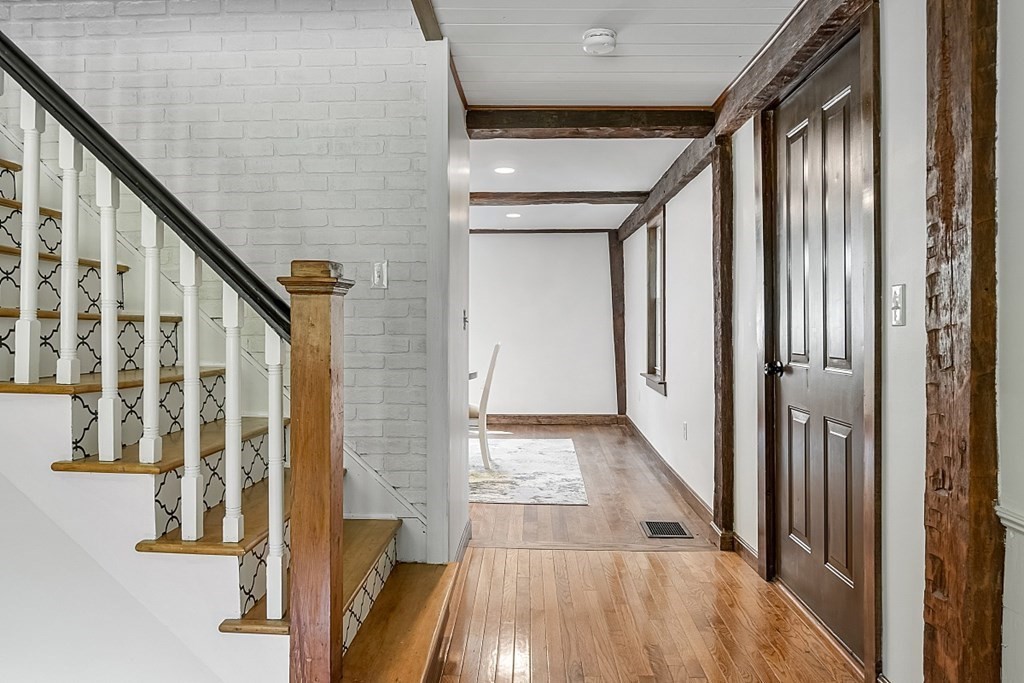 12 Ingerson Road Ashby, MA 01431 - Photo 11 of 42 a view of an entryway with wooden floor and stairs