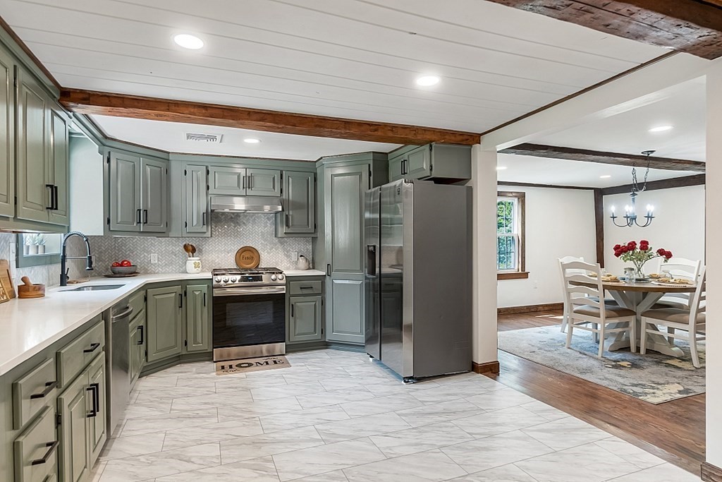 12 Ingerson Road Ashby, MA 01431 - Photo 25 of 42 a kitchen with a sink appliances and cabinets
