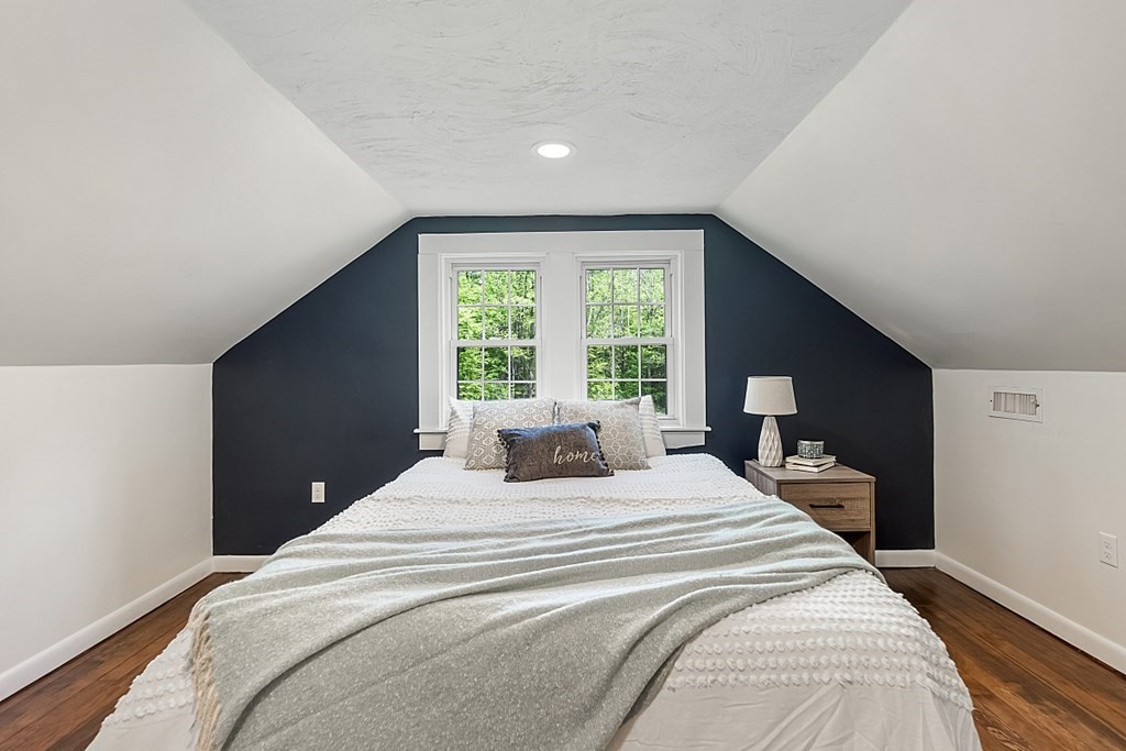 12 Ingerson Road Ashby, MA 01431 - Photo 34 of 42 a bedroom with a large bed and a large window