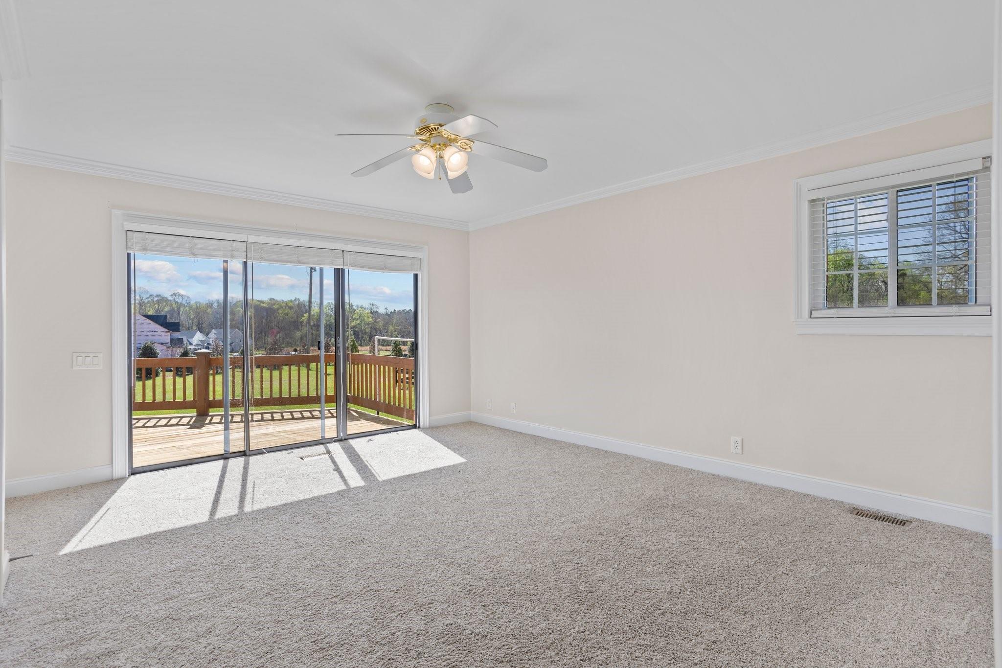 15020 Ranson Road, Unit B Huntersville, NC 28078 - Photo 3 of 40 an empty room with windows and city view