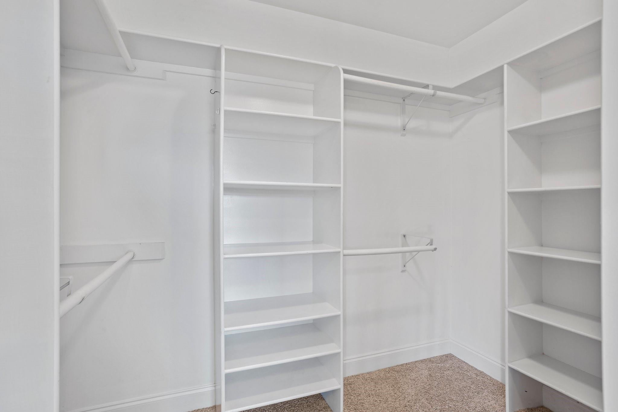 15020 Ranson Road, Unit B Huntersville, NC 28078 - Photo 6 of 40 a view of walk in closet with empty racks