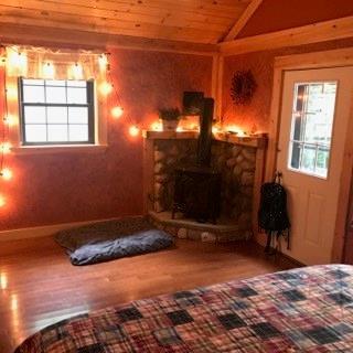 11 Willie Road Stratton, ME 04982 - Photo 21 of 23 Gas fireplace in Master bedroom.