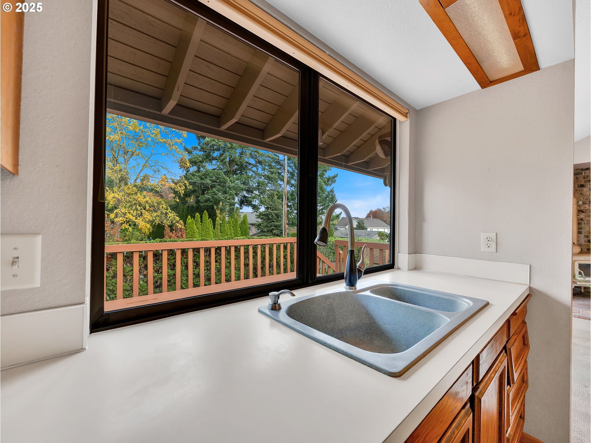 3239 Southwest 26th Street Gresham, OR 97080 - Photo 11 of 47 a view of a balcony dining table and chairs