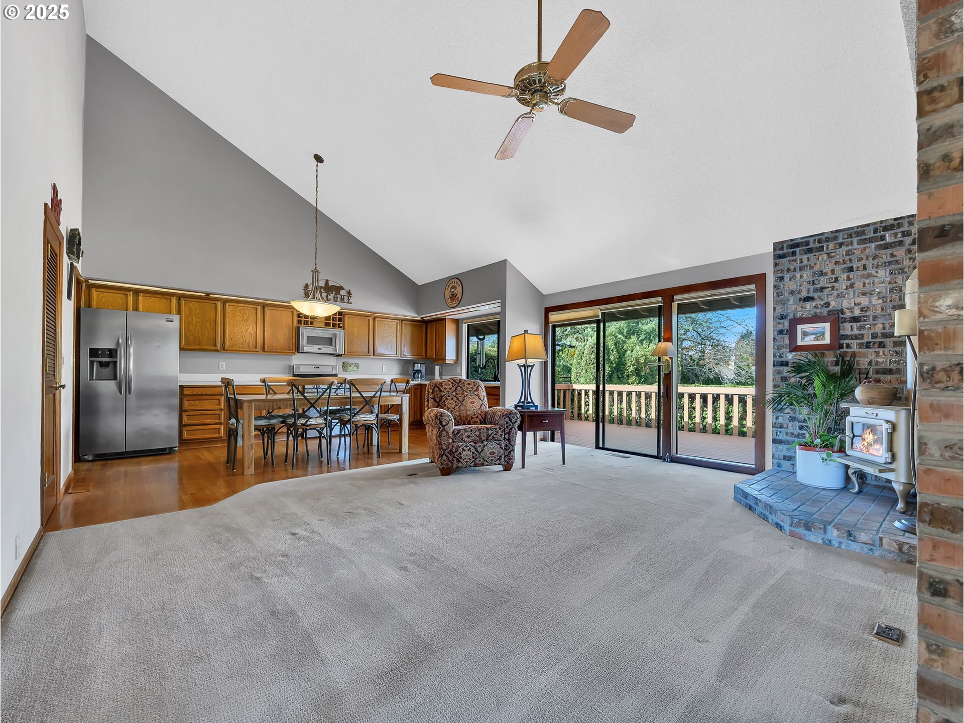 3239 Southwest 26th Street Gresham, OR 97080 - Photo 16 of 47 a view of a livingroom with furniture and a large window