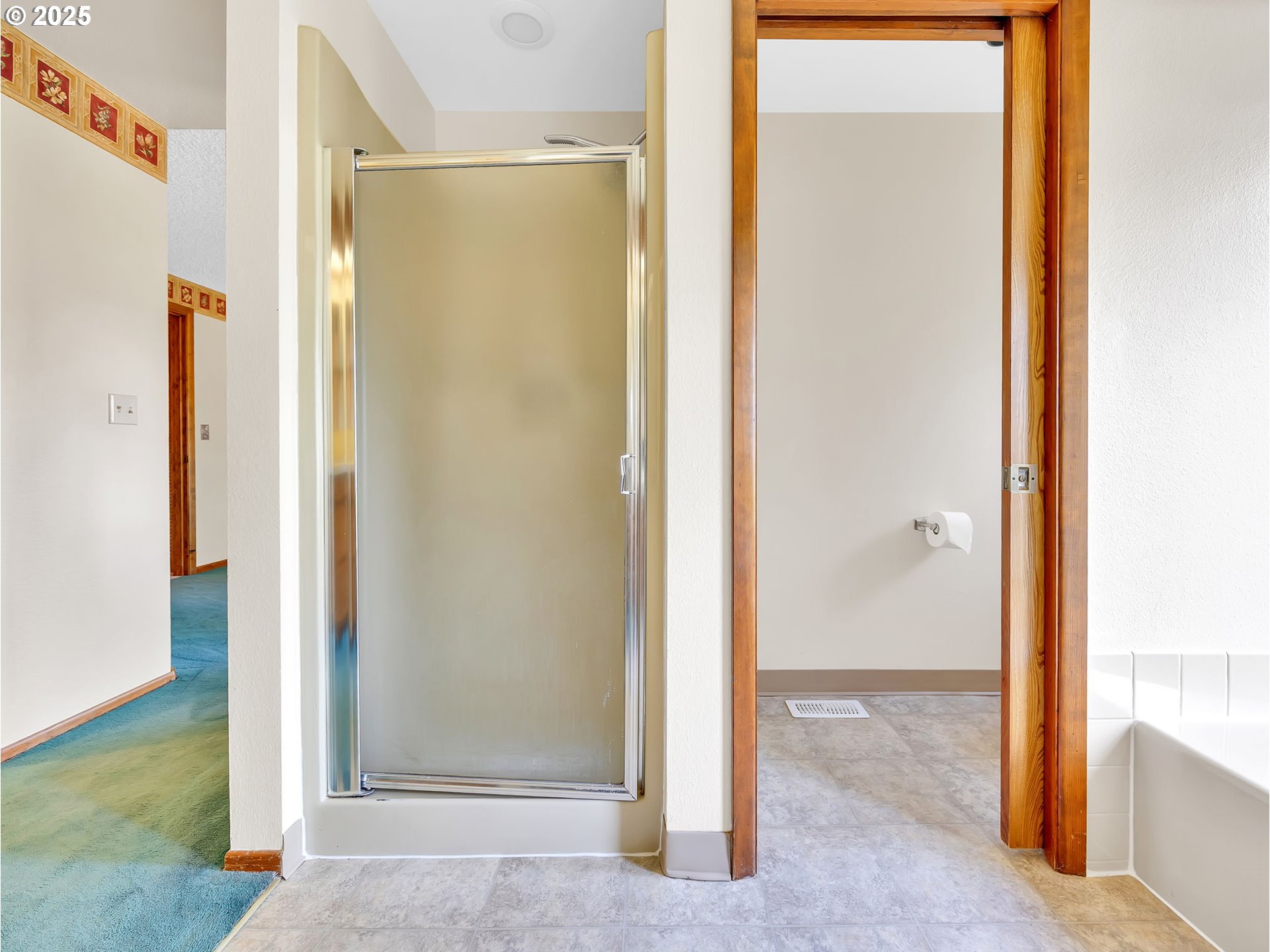 3239 Southwest 26th Street Gresham, OR 97080 - Photo 21 of 47 a view of a bathroom with a tub and shower
