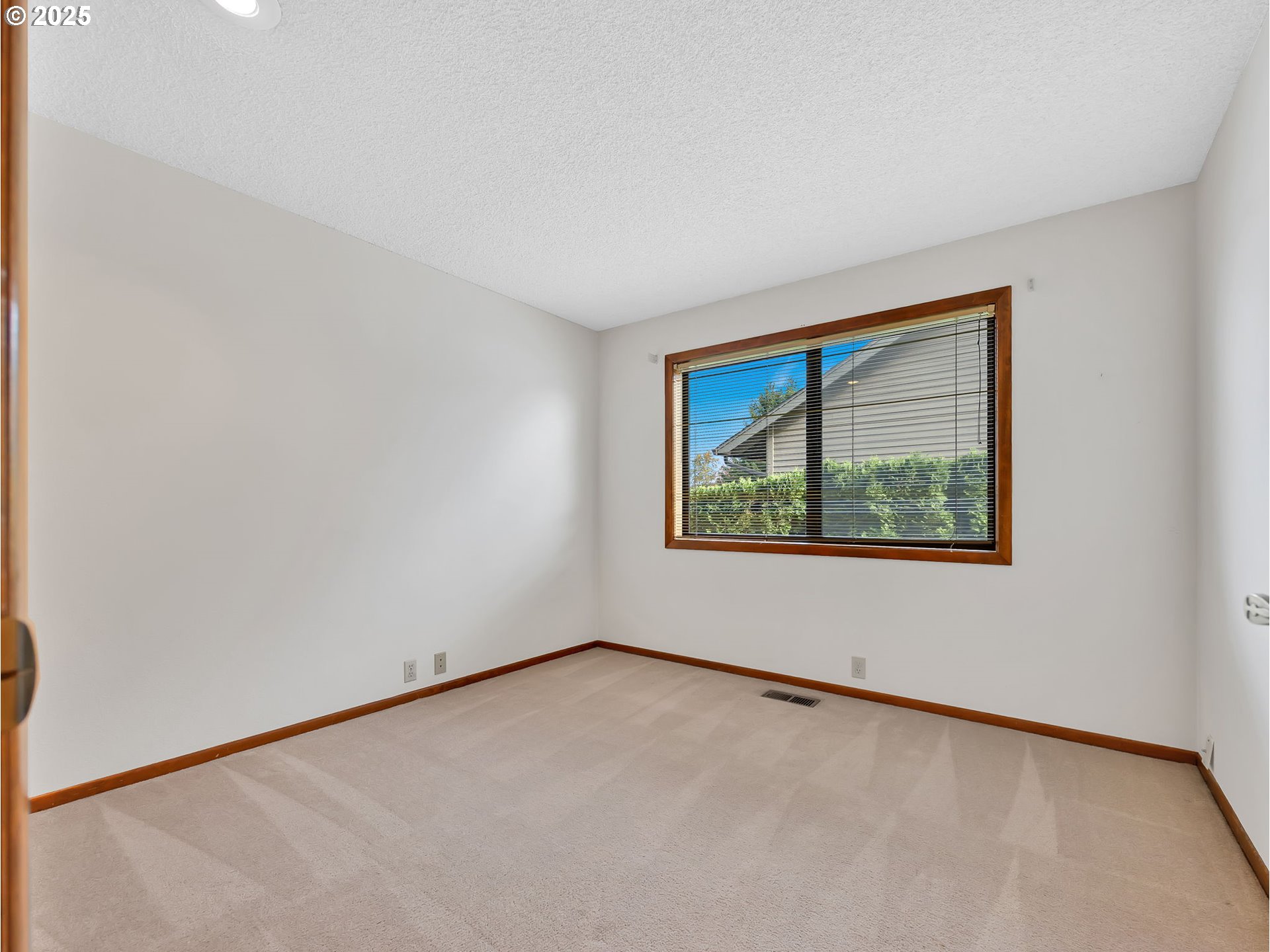 3239 Southwest 26th Street Gresham, OR 97080 - Photo 25 of 47 an empty room with a window