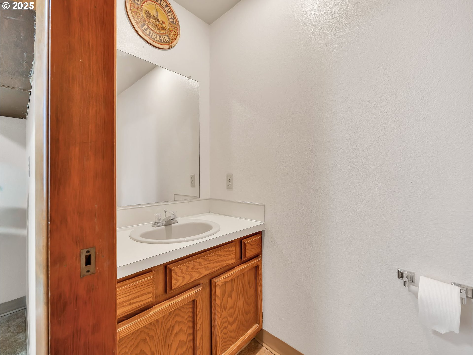 3239 Southwest 26th Street Gresham, OR 97080 - Photo 29 of 47 a bathroom with a sink and a mirror