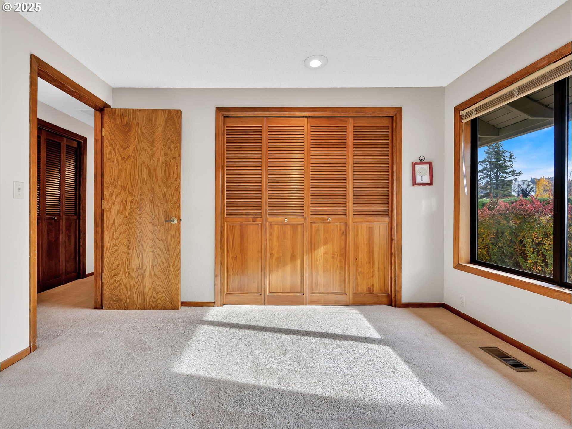 3239 Southwest 26th Street Gresham, OR 97080 - Photo 30 of 47 an empty room with windows and closet
