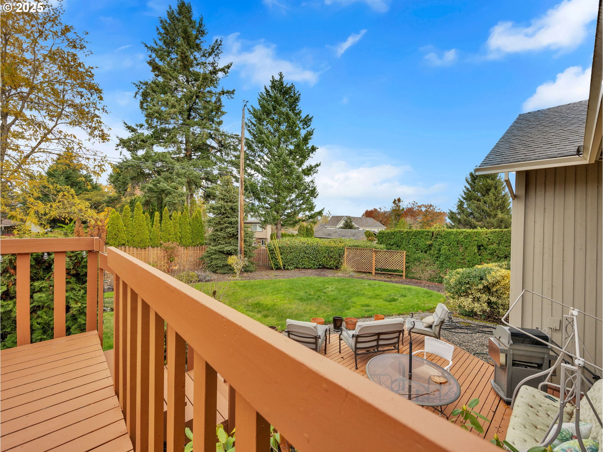 3239 Southwest 26th Street Gresham, OR 97080 - Photo 35 of 47 a view of a wooden deck and a backyard