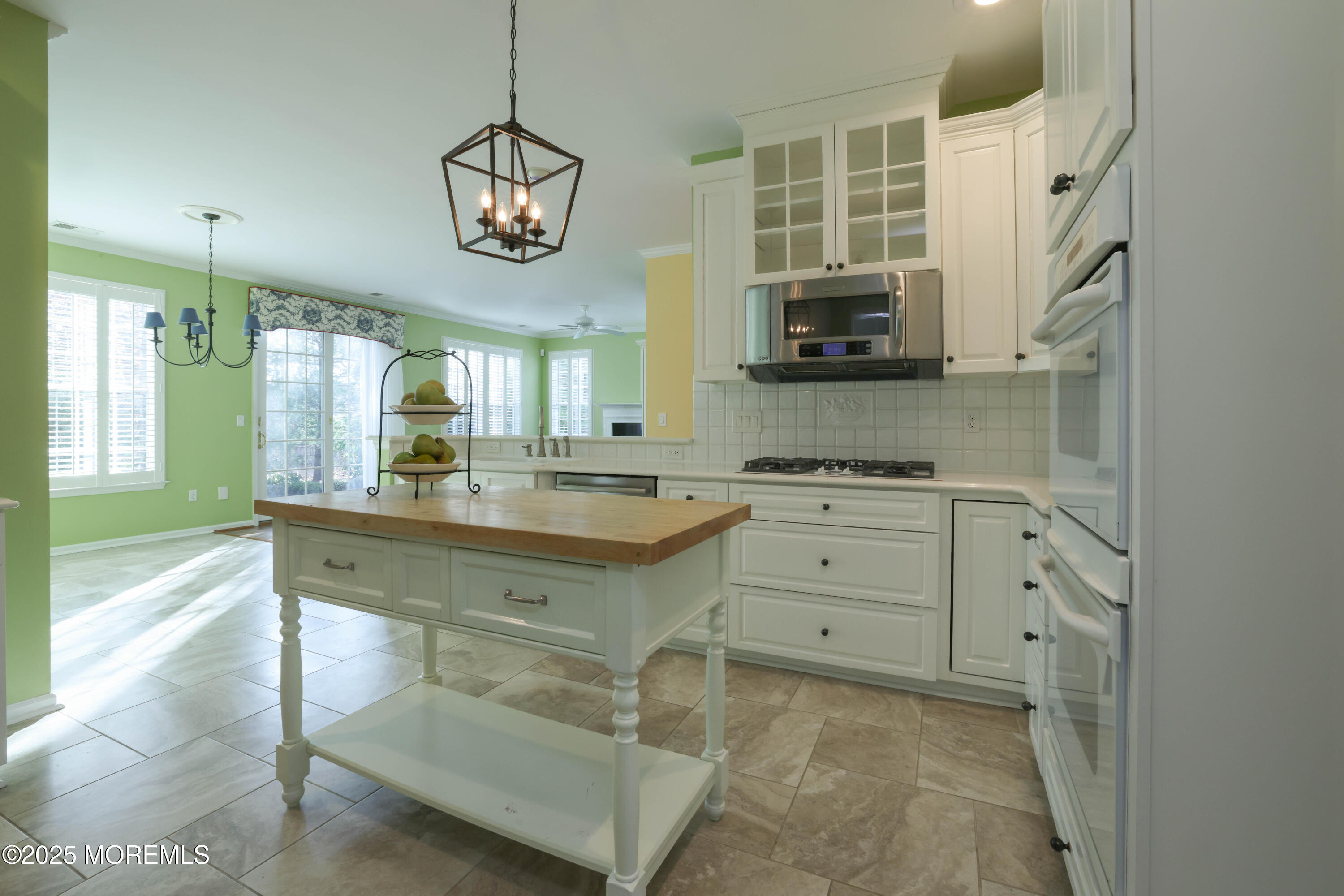 44 Portland Street Barnegat, NJ 08005 - Photo 15 of 47 a bathroom with a granite countertop sink a mirror and a bathtub