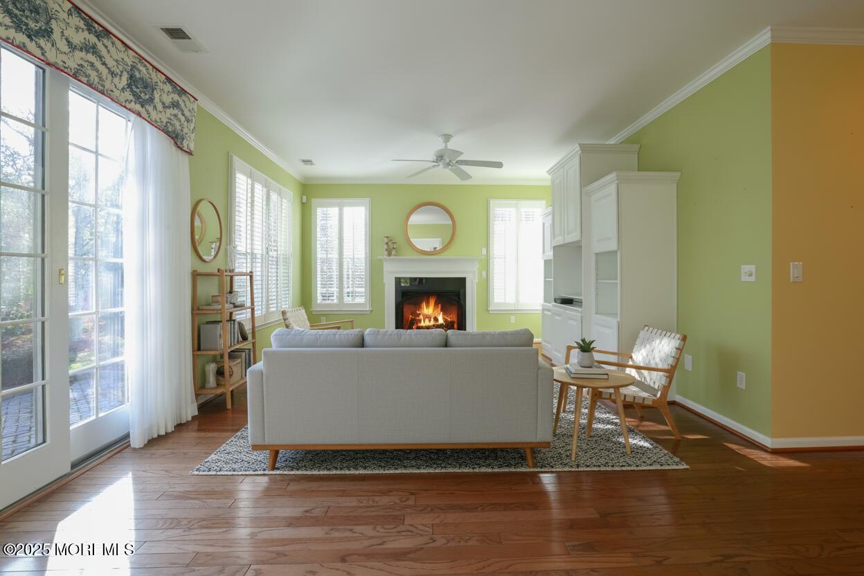 44 Portland Street Barnegat, NJ 08005 - Photo 21 of 47 a living room with furniture and a fireplace