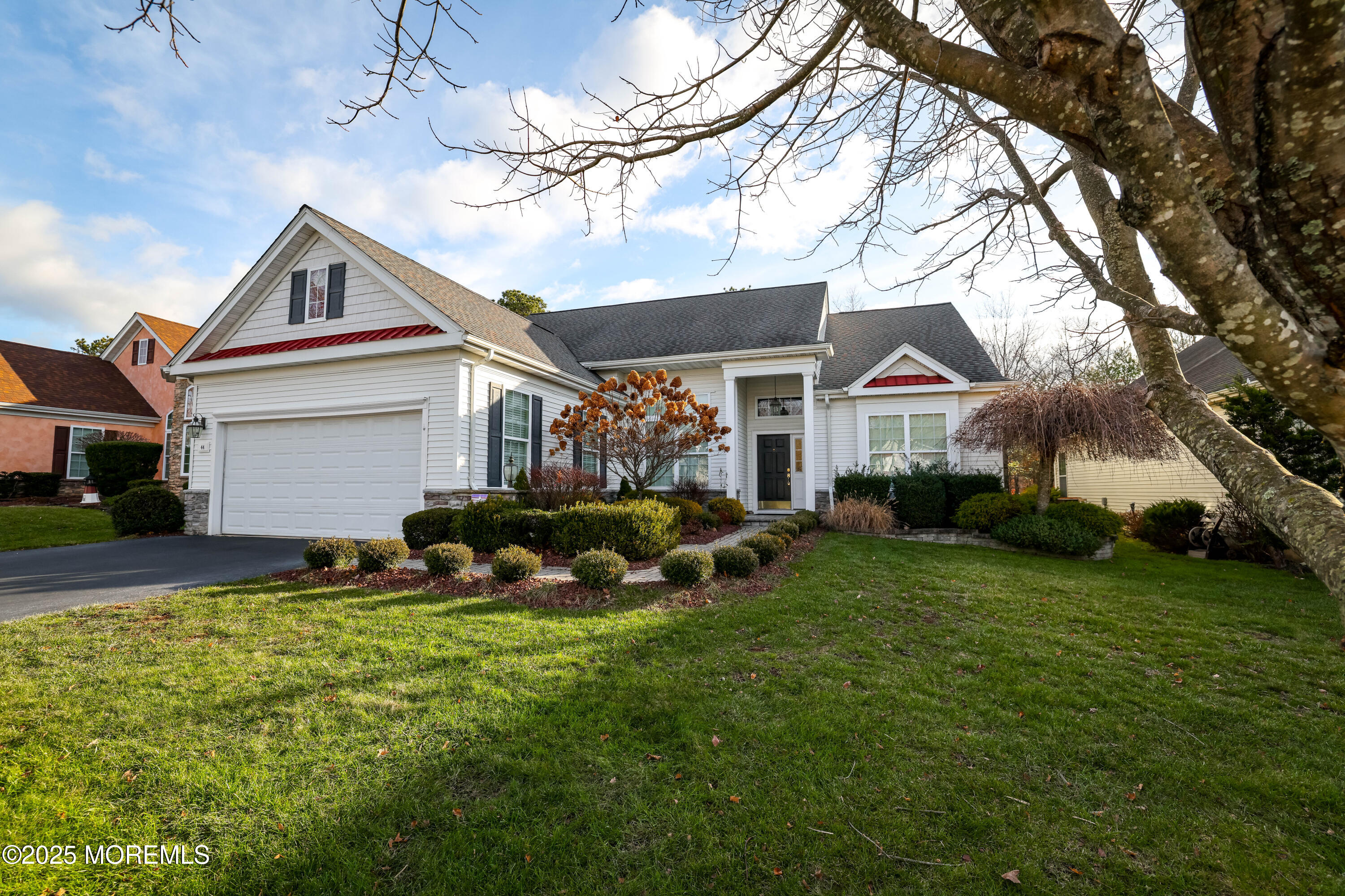 44 Portland Street Barnegat, NJ 08005 - Photo 47 of 47 a front view of a house with a yard and garage