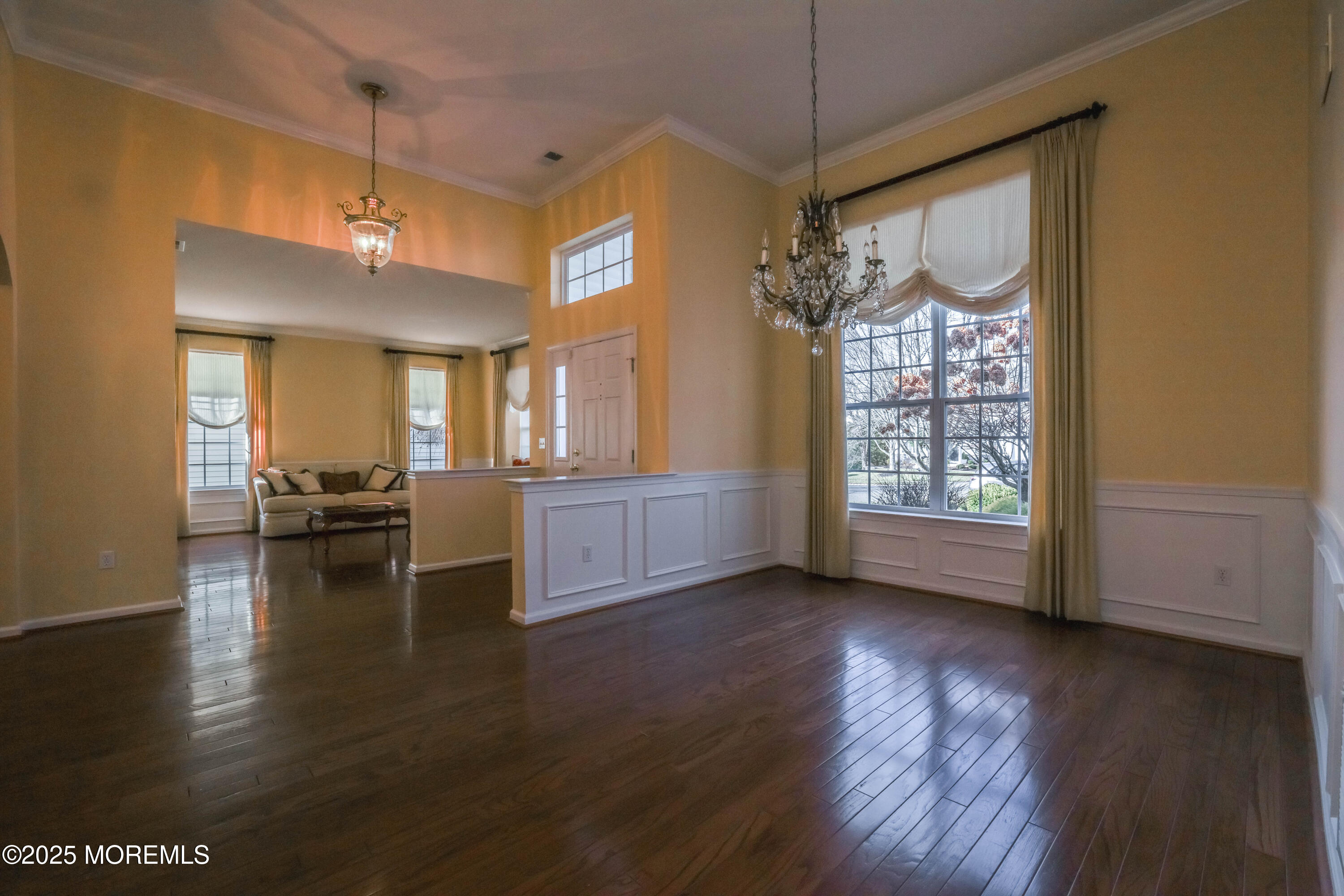 44 Portland Street Barnegat, NJ 08005 - Photo 8 of 47 a view of an empty room with a window and wooden floor