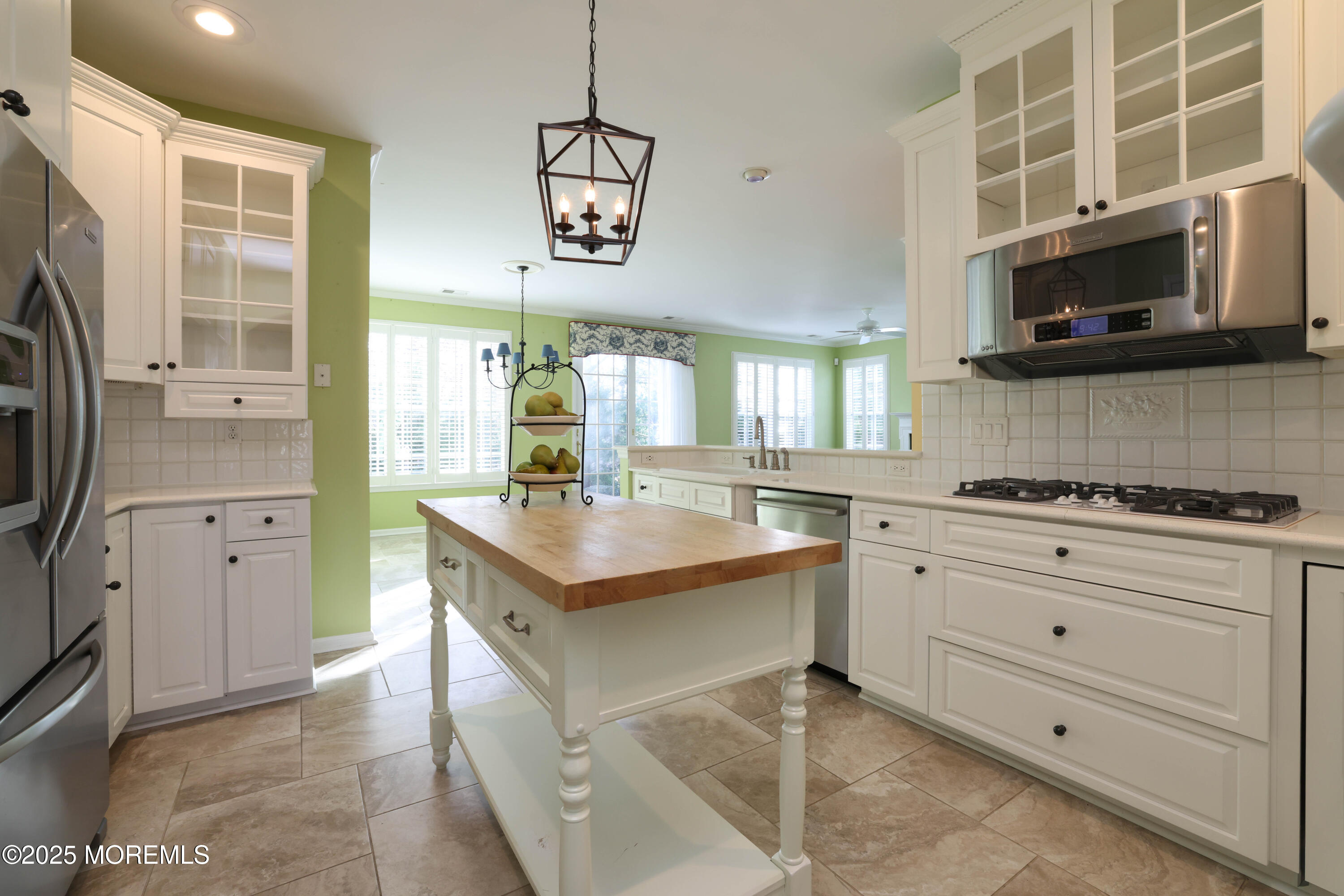 44 Portland Street Barnegat, NJ 08005 - Photo 10 of 47 a kitchen with stainless steel appliances granite countertop a stove and a sink