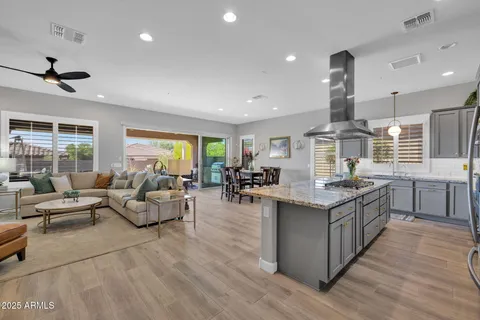 a view of a house with swimming pool and a yard