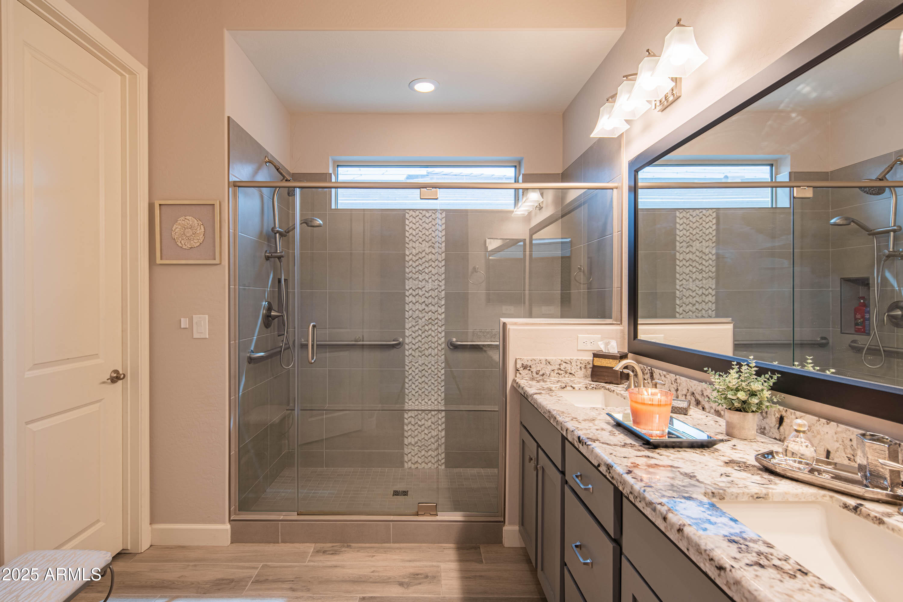 13189 West Caleb Road Peoria, AZ 85383 - Photo 26 of 70 a bathroom with a granite countertop sink mirror and shower