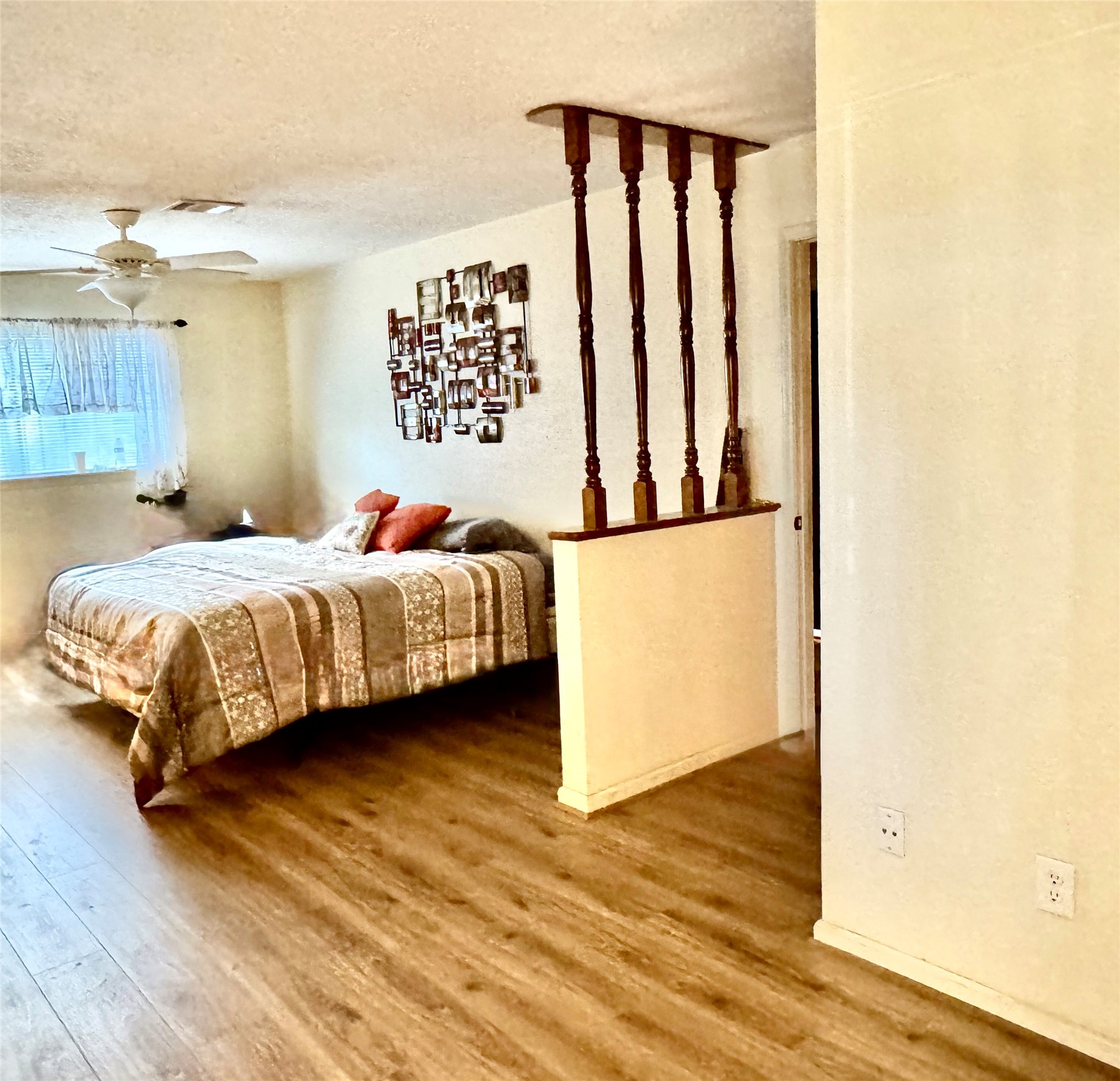 254 Evanston Street Houston, TX 77015 - Photo 12 of 22 a bedroom with a bed and a window