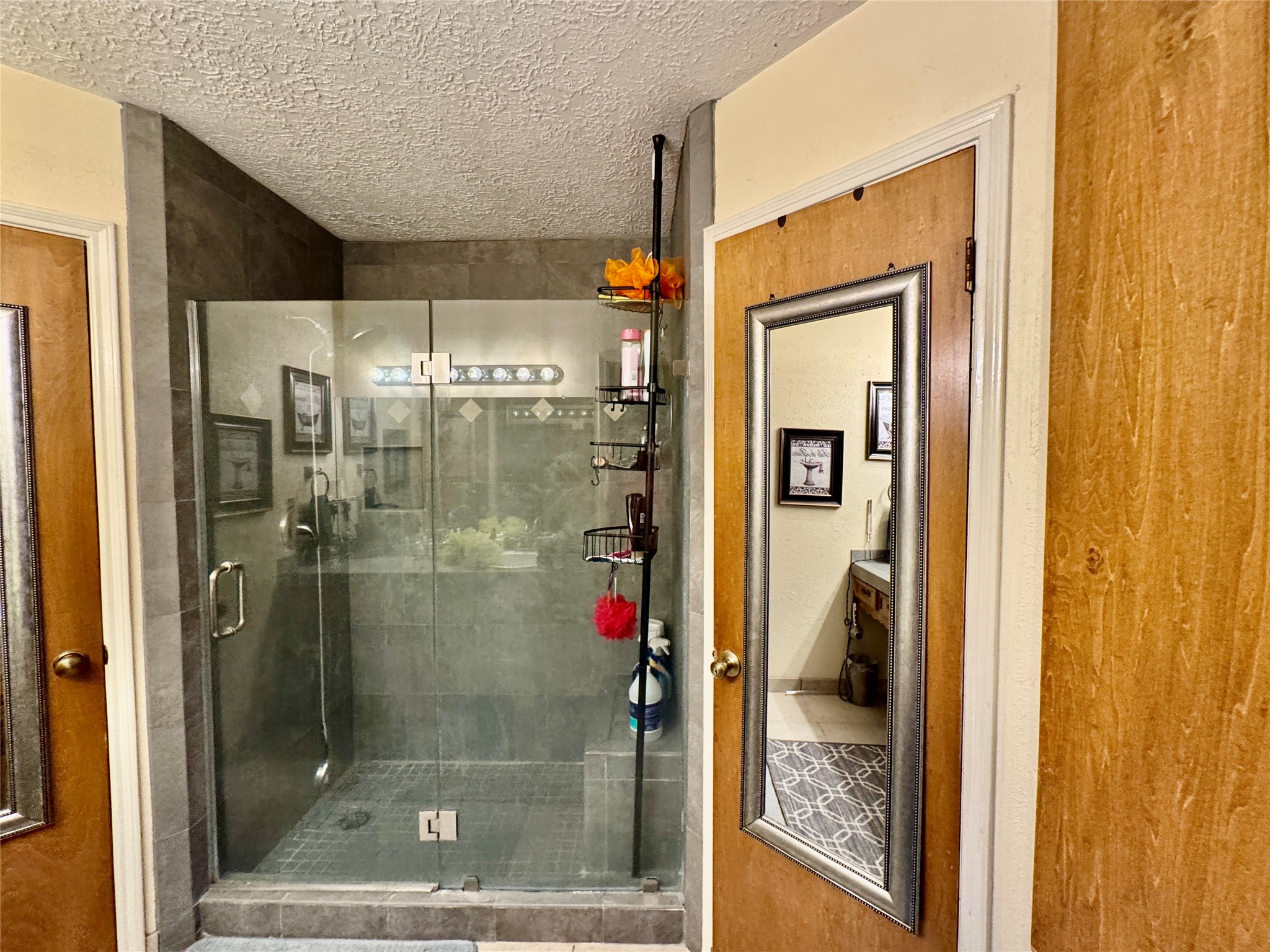 254 Evanston Street Houston, TX 77015 - Photo 15 of 22 a bathroom with a shower and a sink