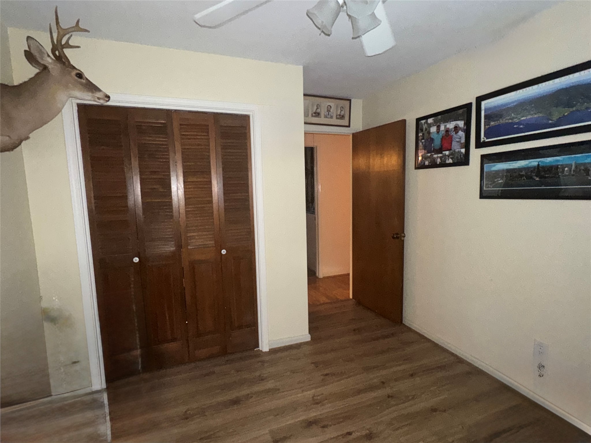 254 Evanston Street Houston, TX 77015 - Photo 17 of 22 a view of a hallway with wooden floor