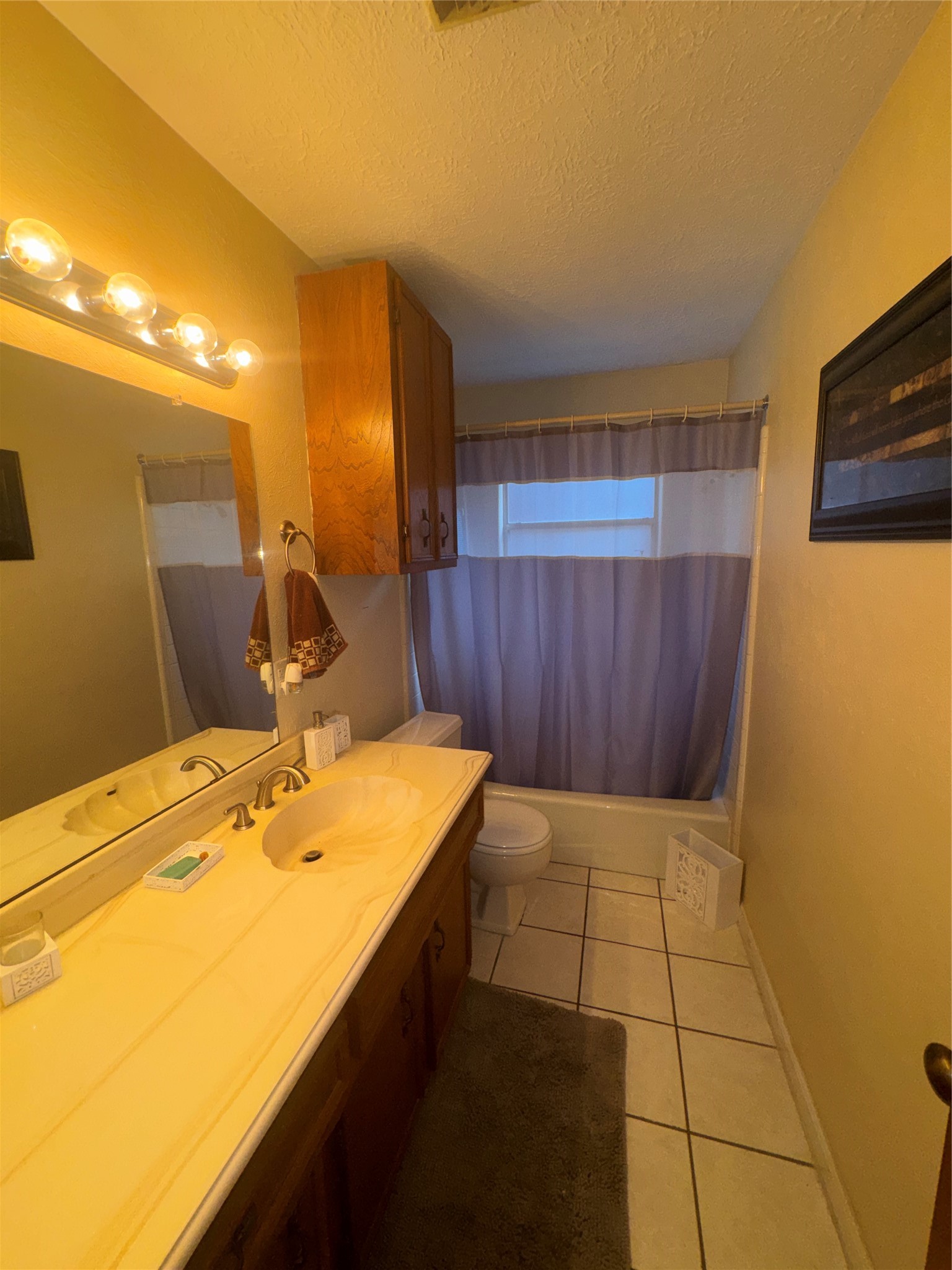 254 Evanston Street Houston, TX 77015 - Photo 18 of 22 a bathroom with a sink and a mirror