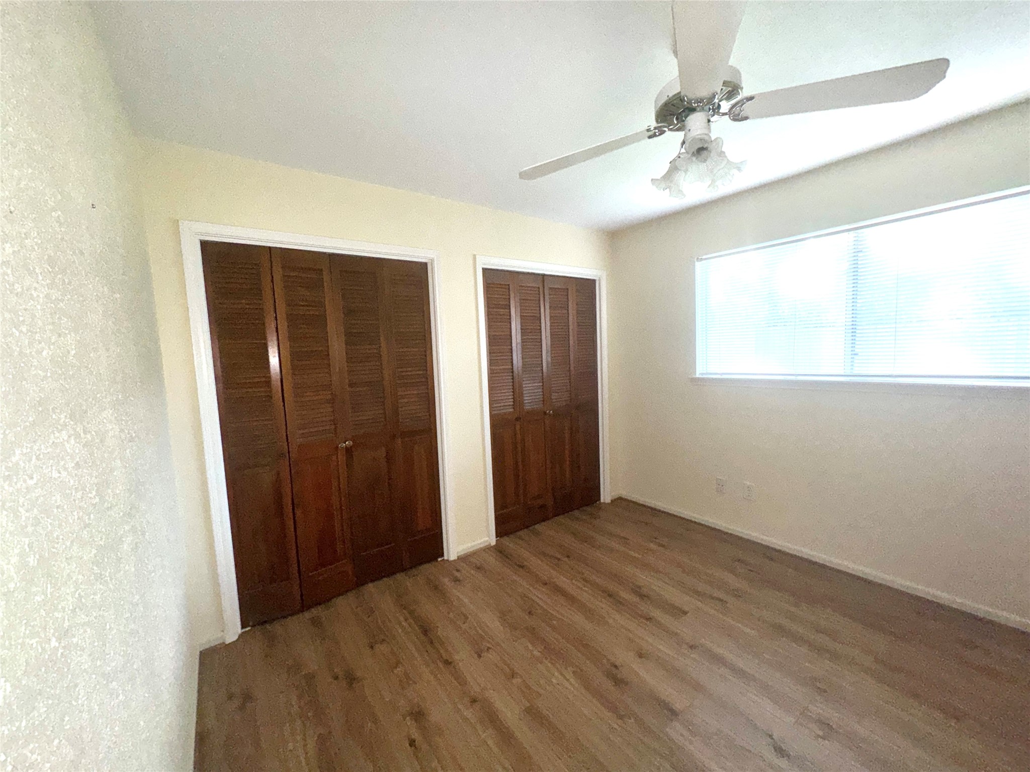 254 Evanston Street Houston, TX 77015 - Photo 19 of 22 a view of empty room with window and ceiling fan