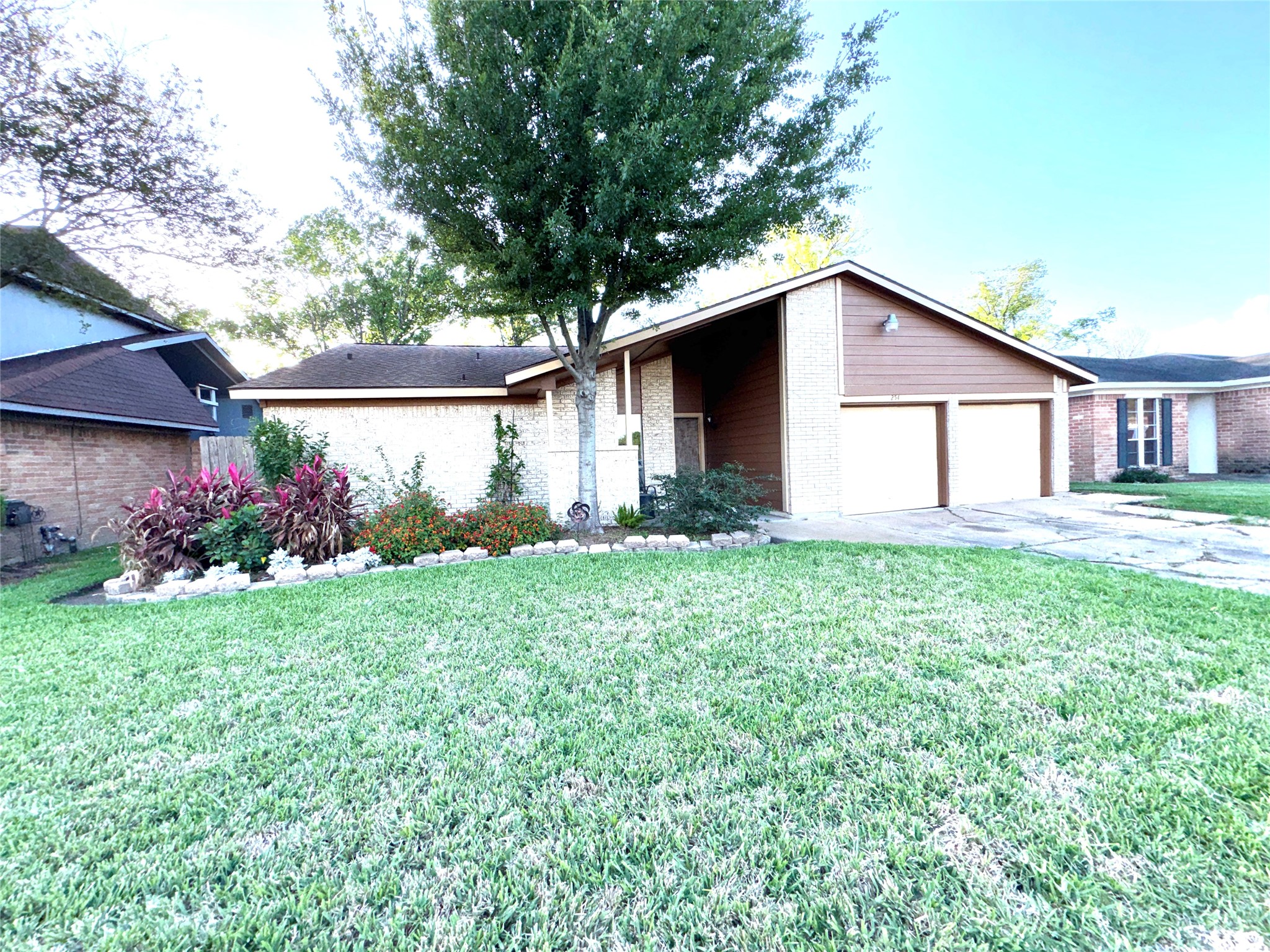 254 Evanston Street Houston, TX 77015 - Photo 3 of 22 a front view of house with yard and green space