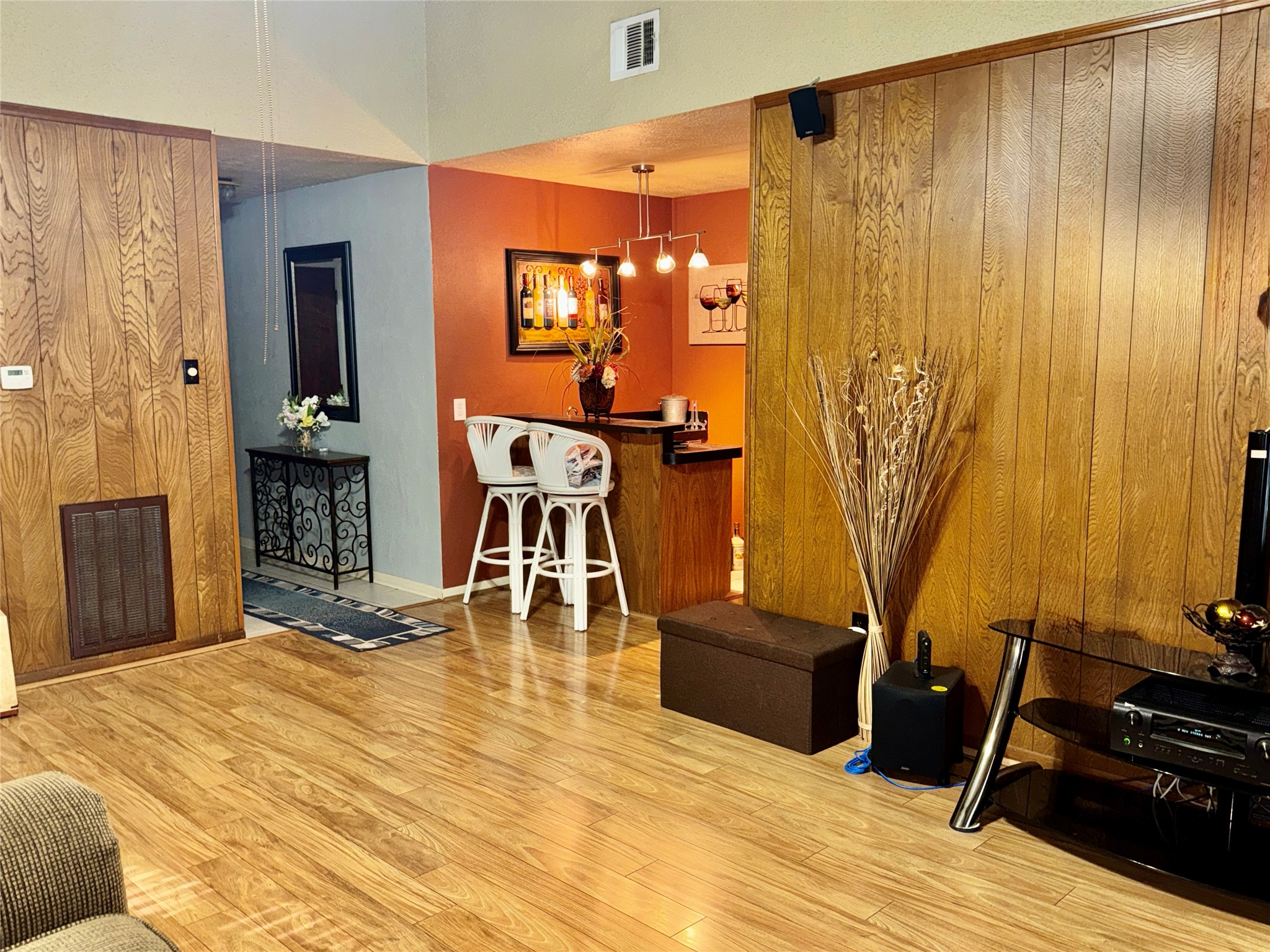 254 Evanston Street Houston, TX 77015 - Photo 6 of 22 a room with wooden floor and furniture