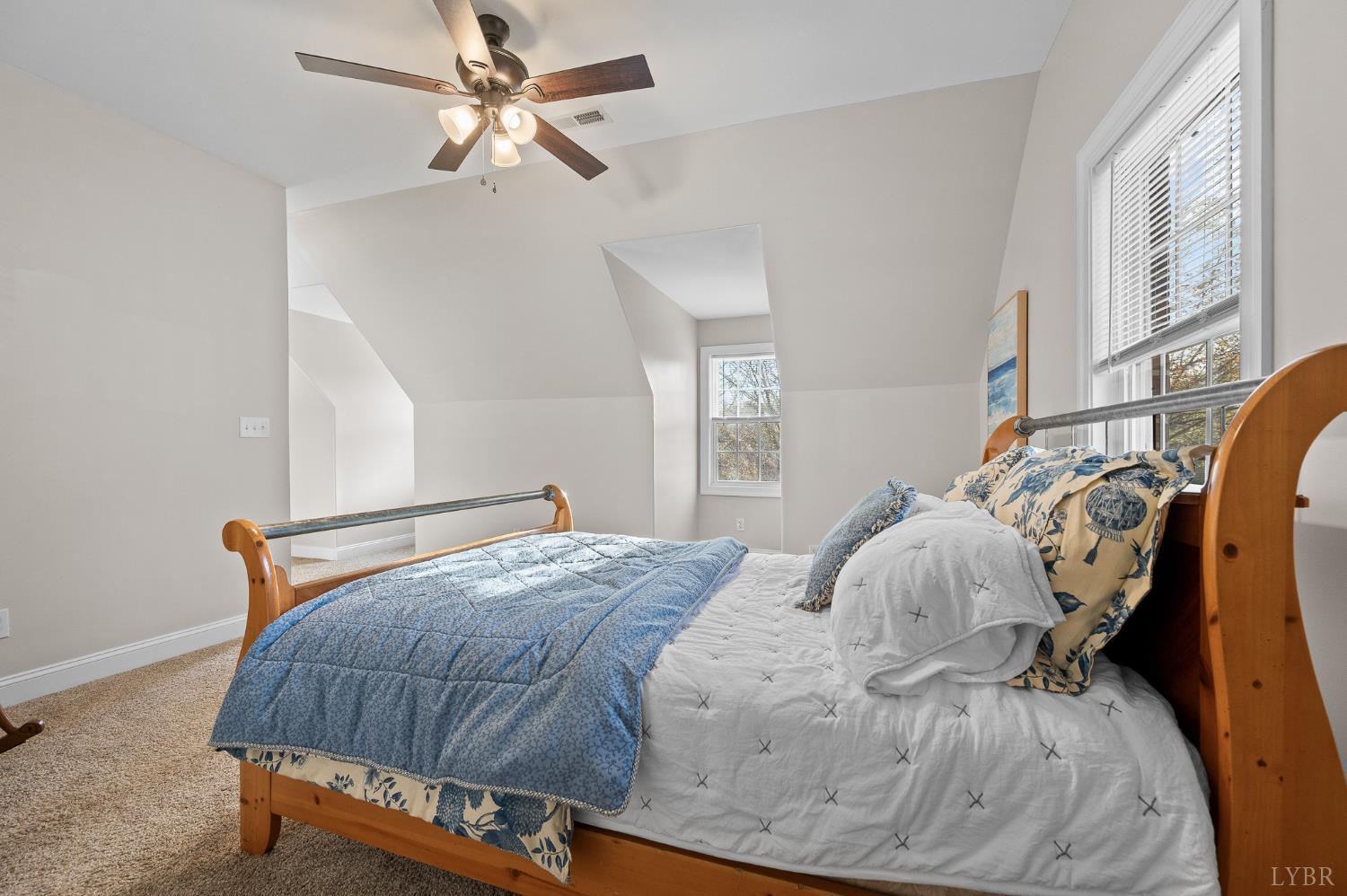 1089 Howards Scenic Trail Forest, VA 24551 - Photo 39 of 96 a bedroom with a bed and window