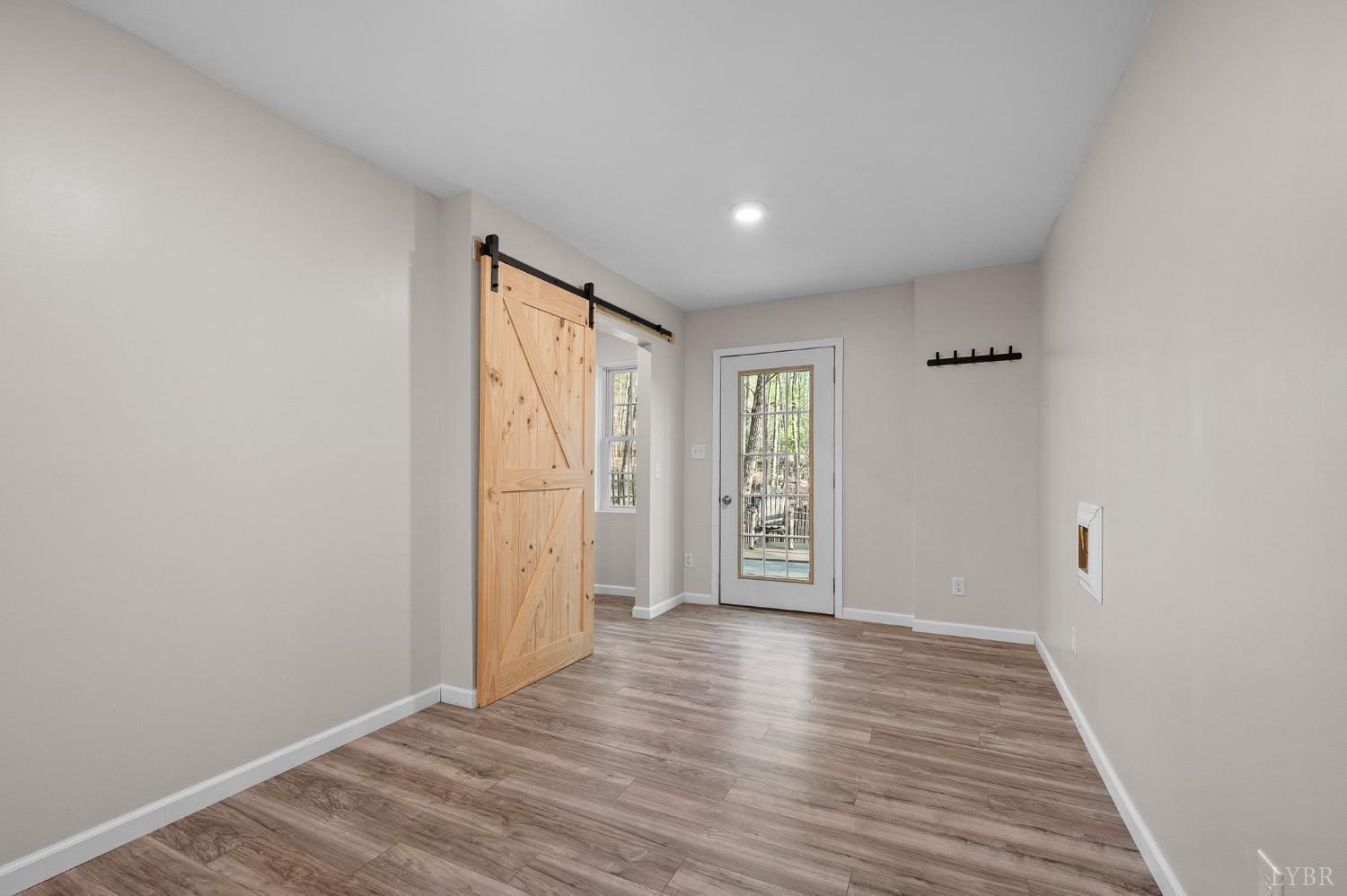 1089 Howards Scenic Trail Forest, VA 24551 - Photo 50 of 96 wooden floor in an empty room with a window