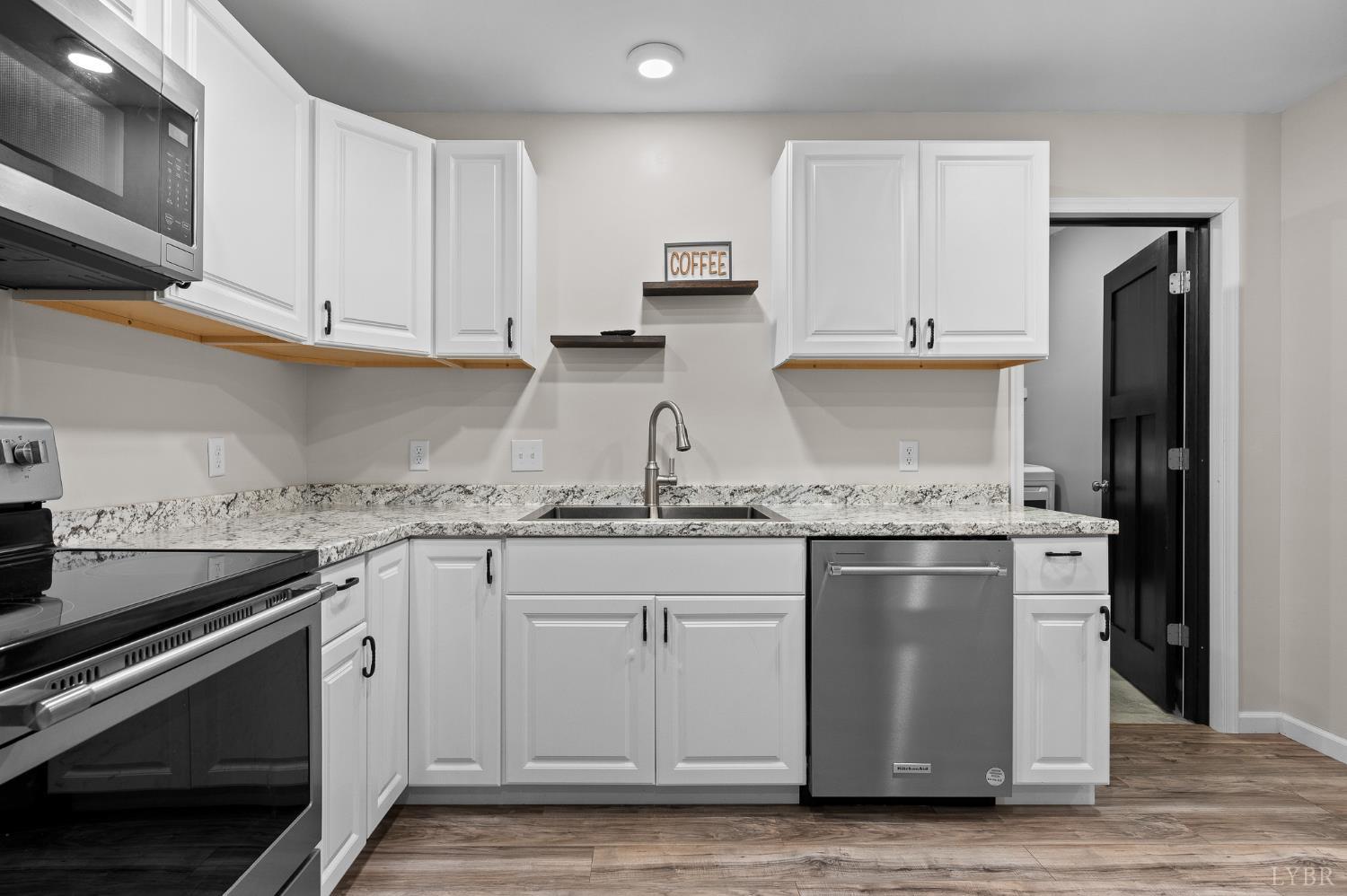 1089 Howards Scenic Trail Forest, VA 24551 - Photo 53 of 96 a kitchen with stainless steel appliances granite countertop a sink stove and refrigerator