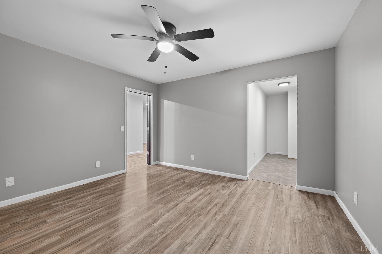 1089 Howards Scenic Trail Forest, VA 24551 - Photo 59 of 96 an empty room with wooden floor and windows