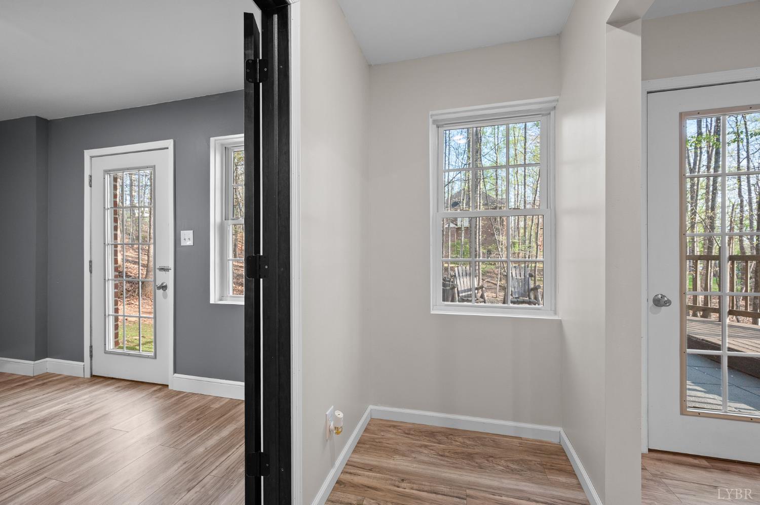 1089 Howards Scenic Trail Forest, VA 24551 - Photo 63 of 96 a view of an empty room with wooden floor and a window