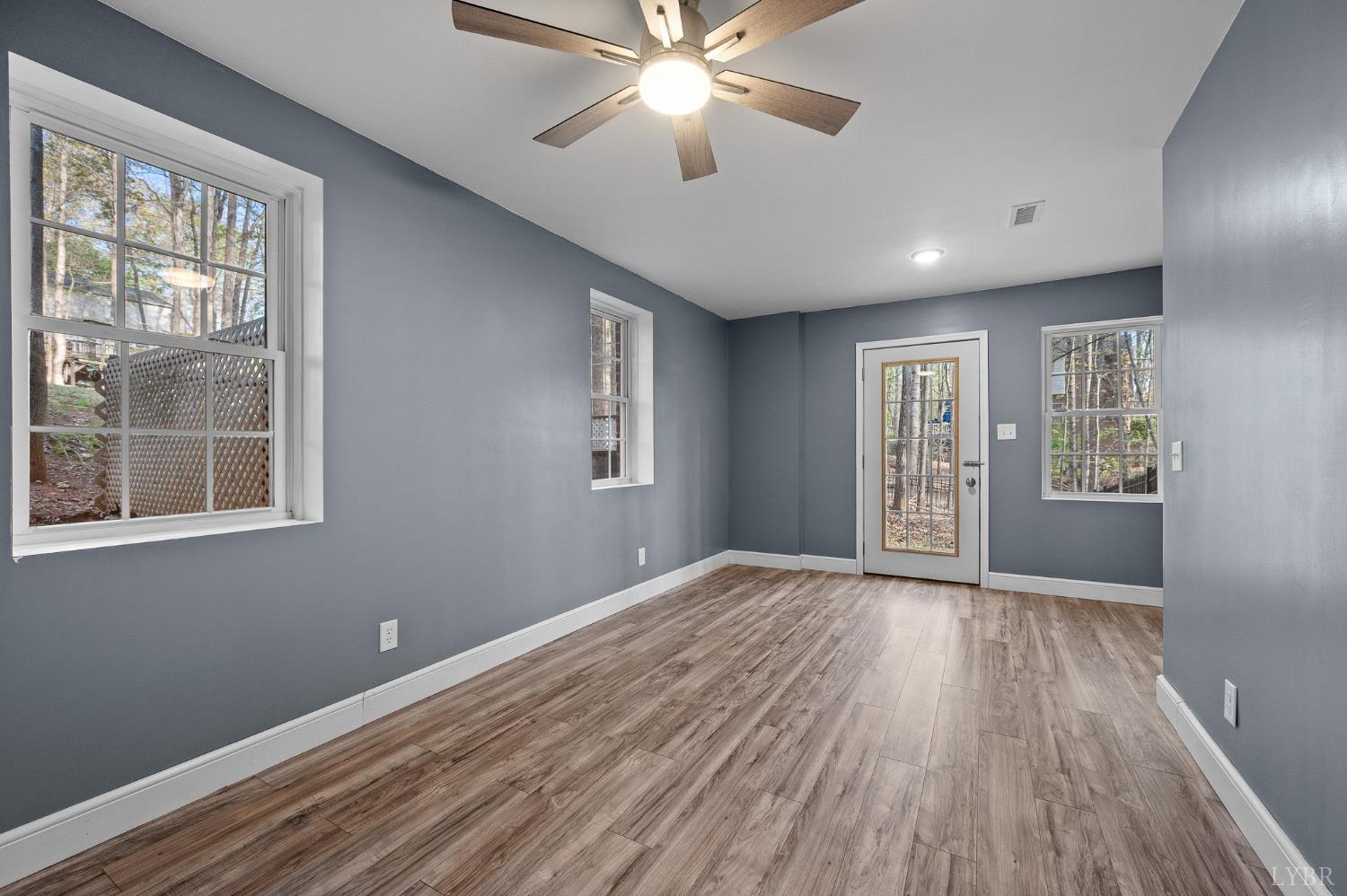 1089 Howards Scenic Trail Forest, VA 24551 - Photo 65 of 96 a view of an empty room with a window and wooden floor