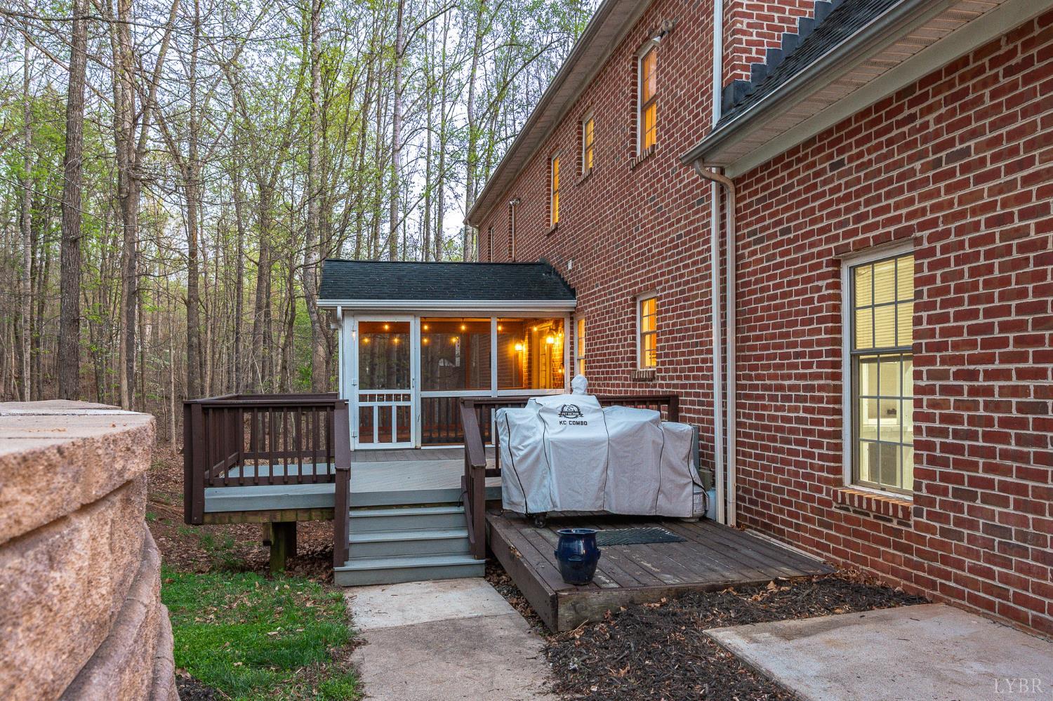 1089 Howards Scenic Trail Forest, VA 24551 - Photo 73 of 96 a front view of a house with a garden