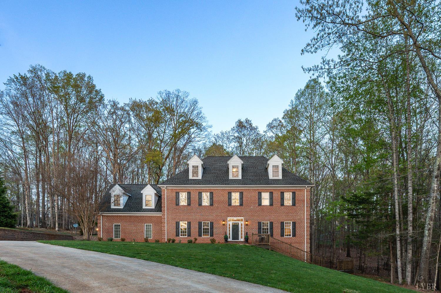 1089 Howards Scenic Trail Forest, VA 24551 - Photo 78 of 96 a view of a brick building next to a yard