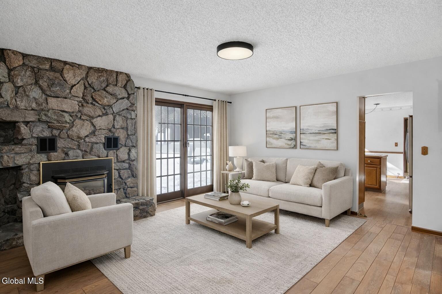 42 Vosburgh Road Halfmoon, NY 12118 - Photo 21 of 58 Modern living room with fireplace and ar