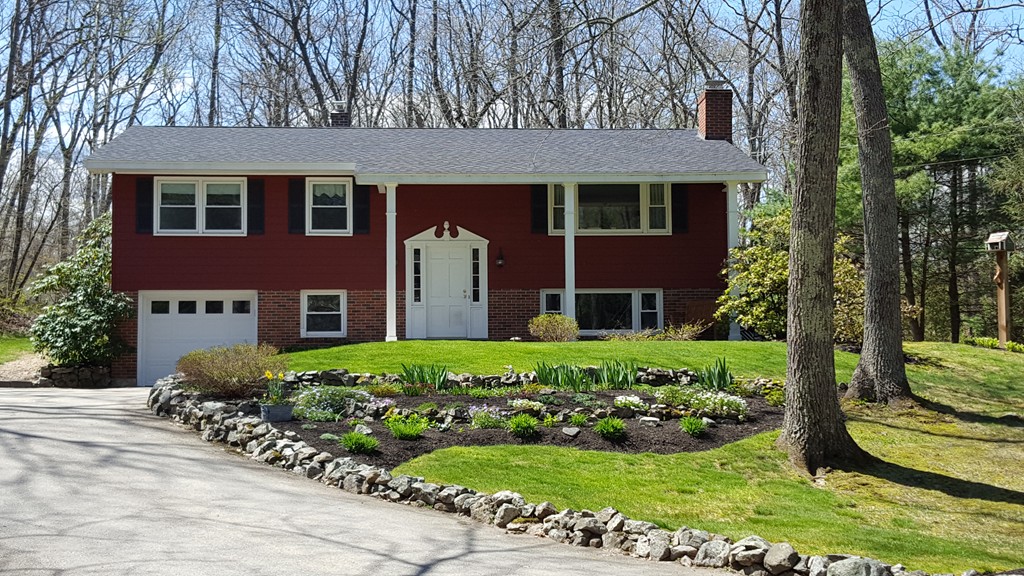15 Stage Coach Road Boxford, MA 01921 - Photo 1 of 29 a view of a brick house with a yard and plants