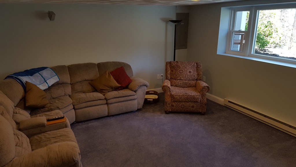 15 Stage Coach Road Boxford, MA 01921 - Photo 22 of 29 a living room with furniture and a window