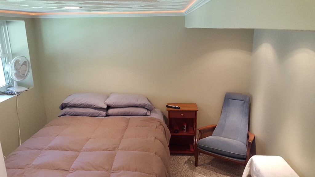 15 Stage Coach Road Boxford, MA 01921 - Photo 23 of 29 a bedroom with a bed and a chair