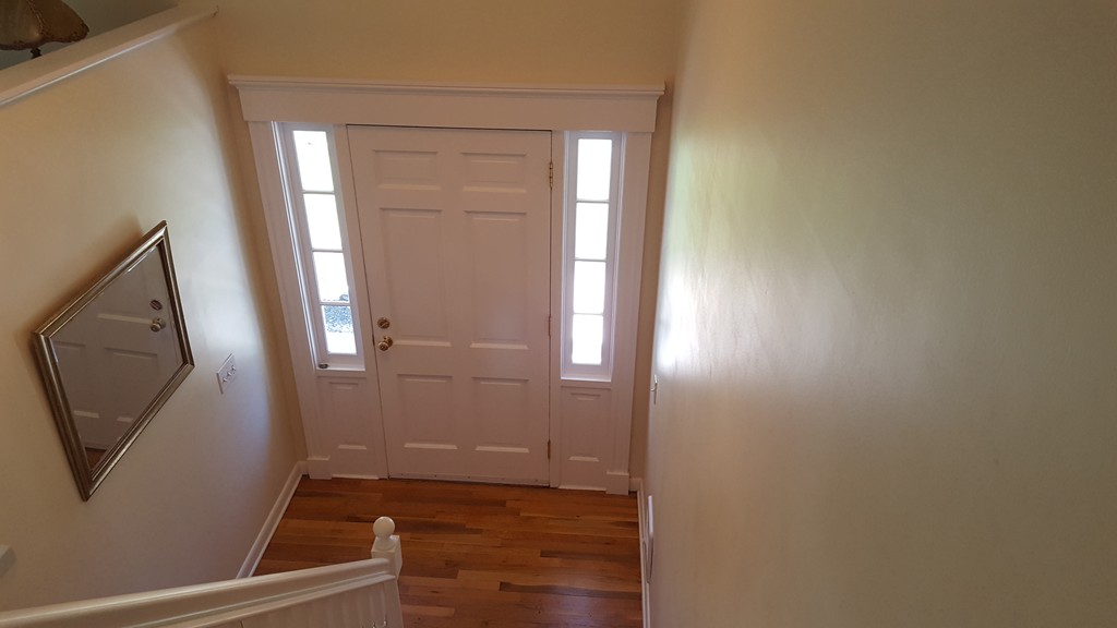 15 Stage Coach Road Boxford, MA 01921 - Photo 5 of 29 an empty room with wooden floor and mirror