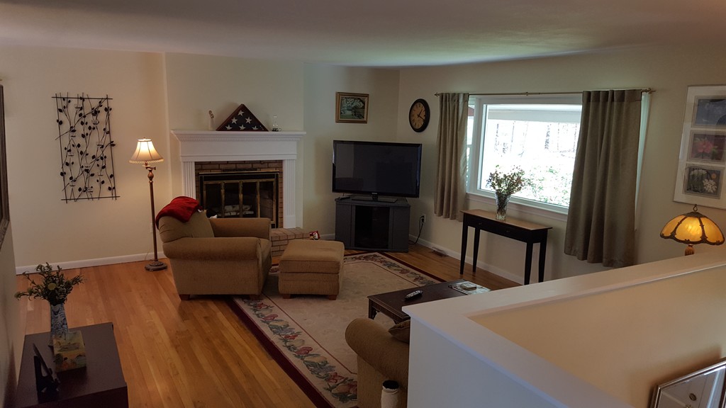 15 Stage Coach Road Boxford, MA 01921 - Photo 6 of 29 a living room with furniture and a fireplace