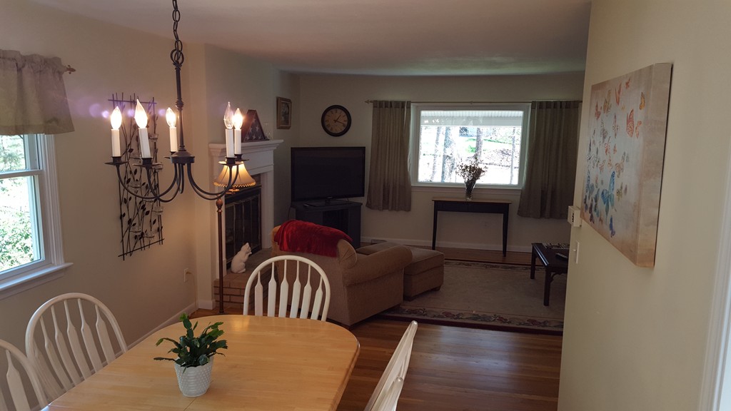 15 Stage Coach Road Boxford, MA 01921 - Photo 9 of 29 a living room with furniture and a fireplace