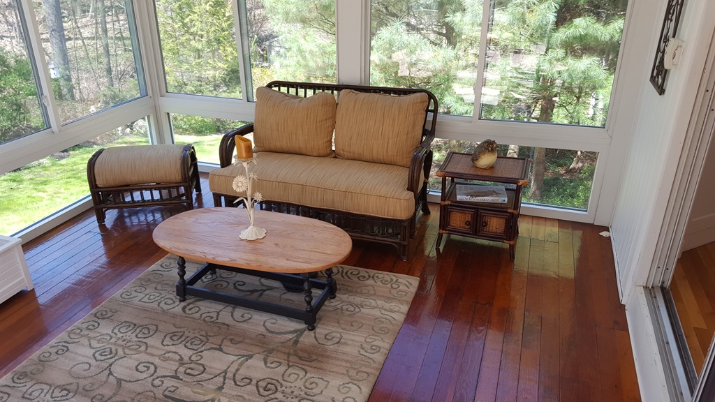 15 Stage Coach Road Boxford, MA 01921 - Photo 10 of 29 a outdoor living room with furniture and a wooden floor