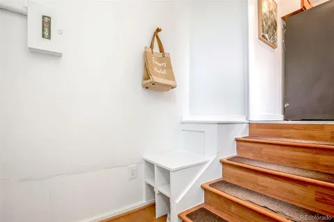 a view of a big room with closet and windows