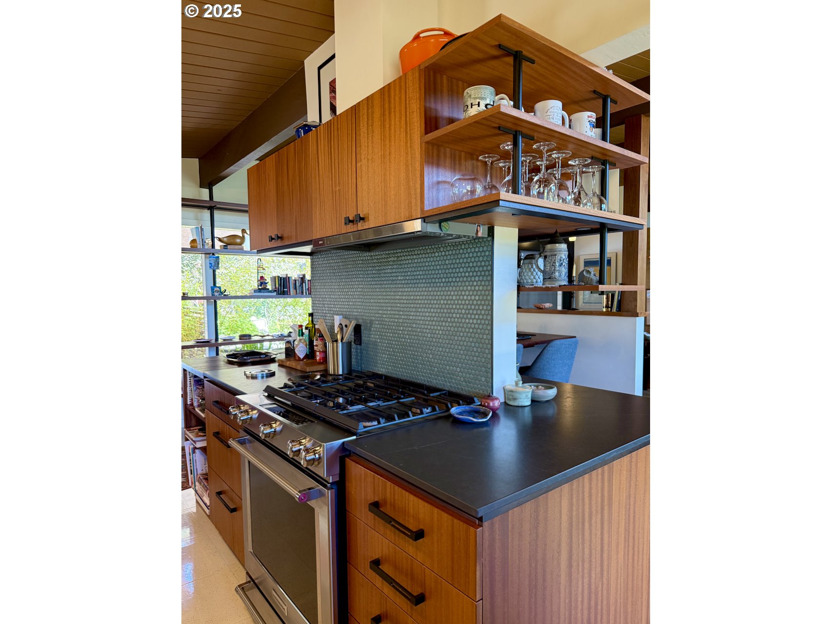 2203 Lorane Highway Eugene, OR 97405 - Photo 17 of 46 a kitchen with stainless steel appliances granite countertop a stove and a sink